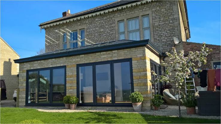 How to Plan Sunroom Construction Extensions on a Budget: A Complete Guide